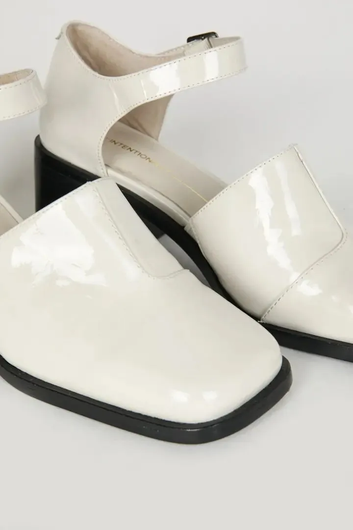 IB MARTY PATENT MARY JANE HEELS IN WHITE